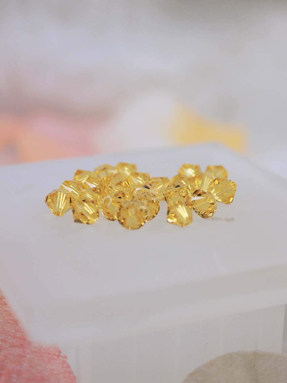 Swarovski Beads 5328 - 5mm - 24pc - Light Topaz