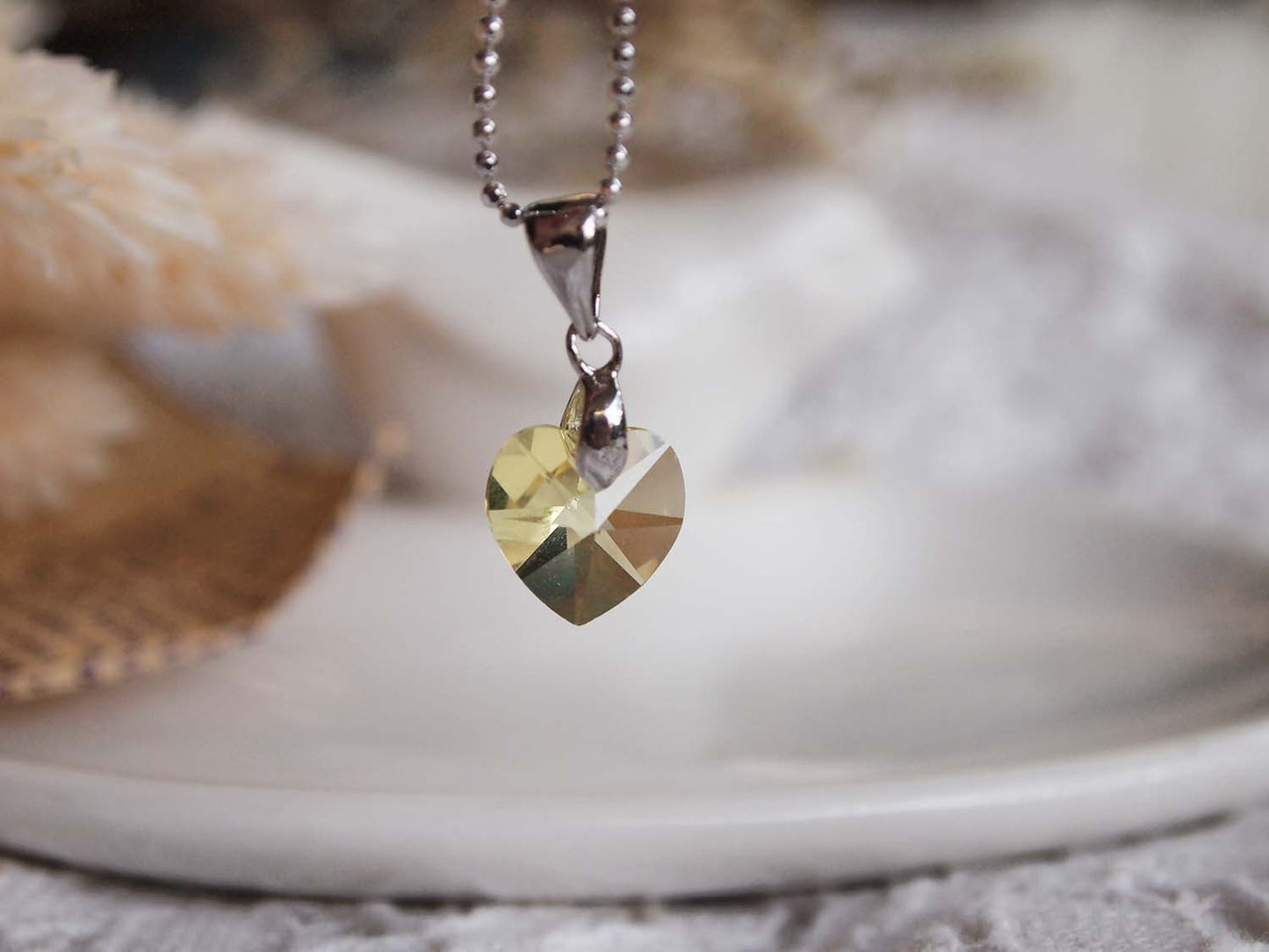 Swarovski Elements 6228 - 10mm - 4pc - Topaz AB